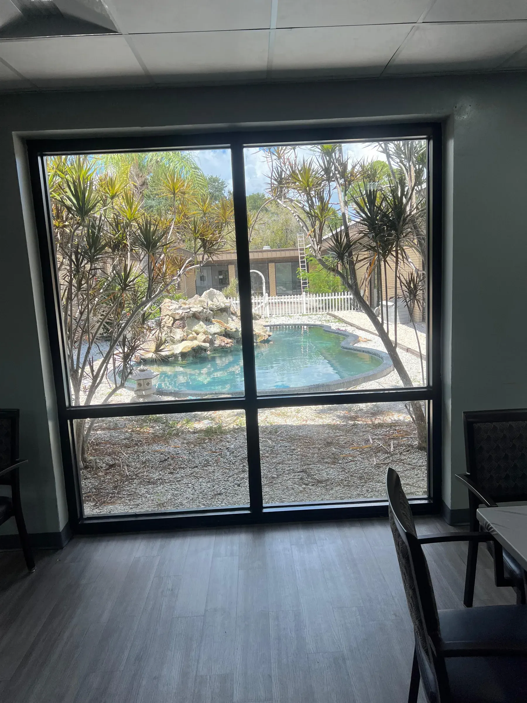 The courtyard at Vivo Healthcare Gateway, seen through the lounge windows