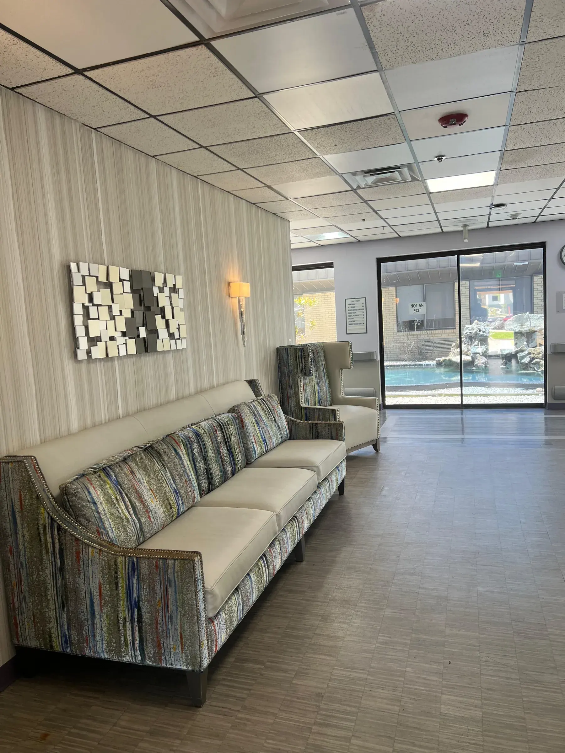 A lounge at Vivo Healthcare Gateway, with sofas and armchairs